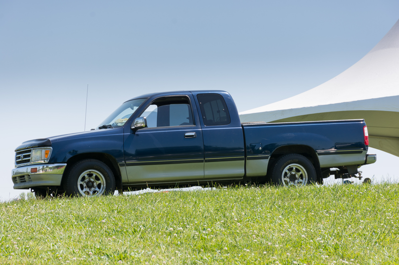 Remarkably-clean, two-toned Toyota T100. These have rusted to oblivion up North where I live.